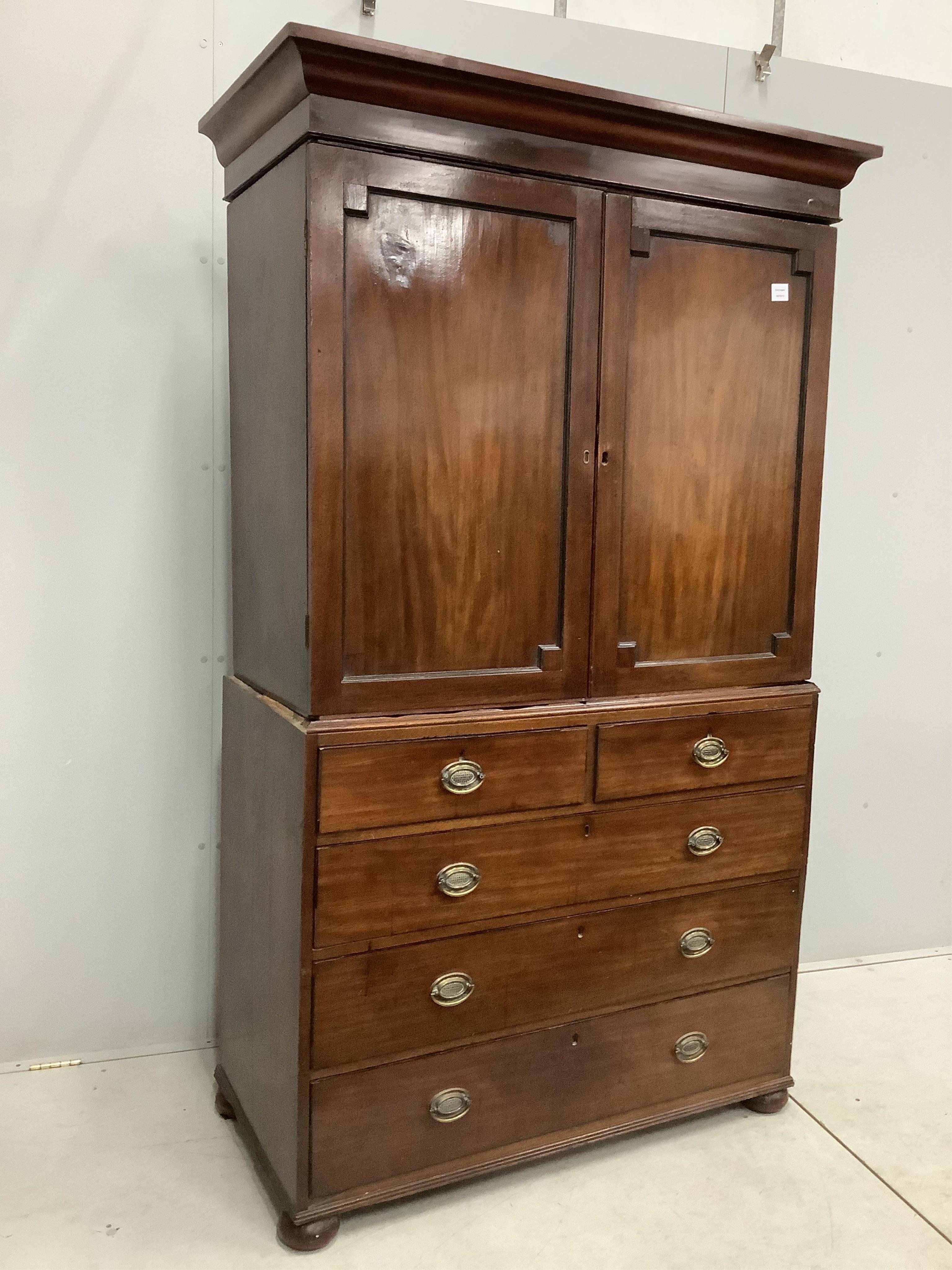 A Regency mahogany linen press, width 114cm, depth 53cm, height 200cm. Condition - poor